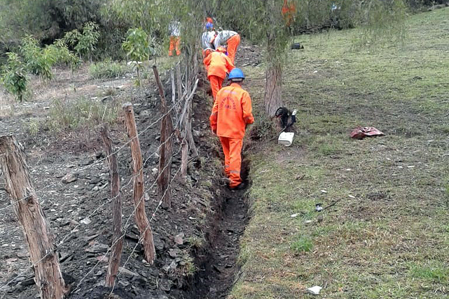 Ditch digging for water pipes